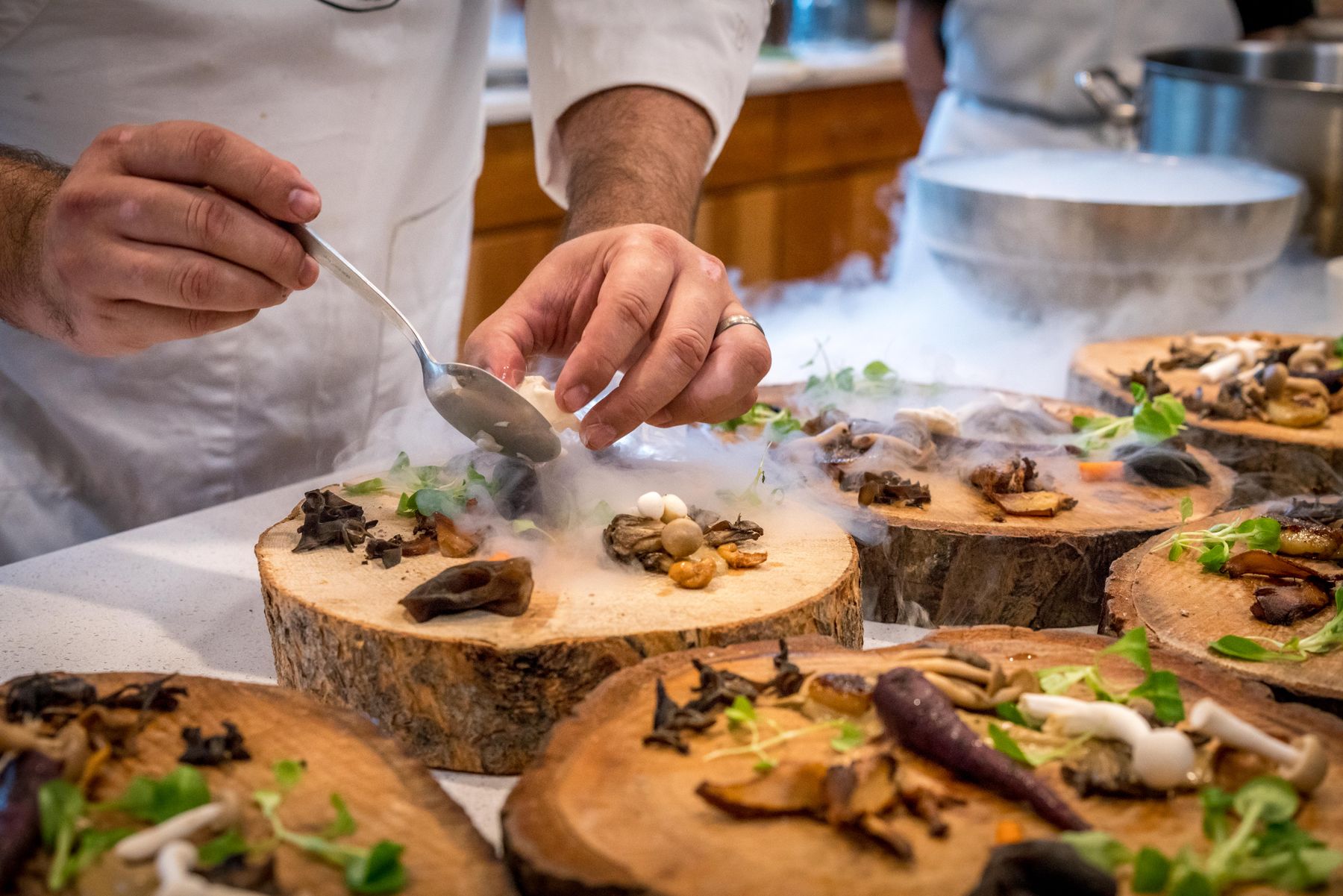Chef preparing dishes in a restaurant kitchen